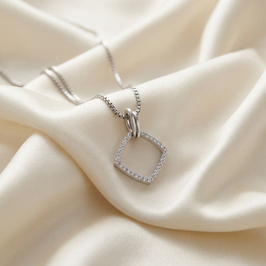 Diamond shape pendant in white gold - angled view