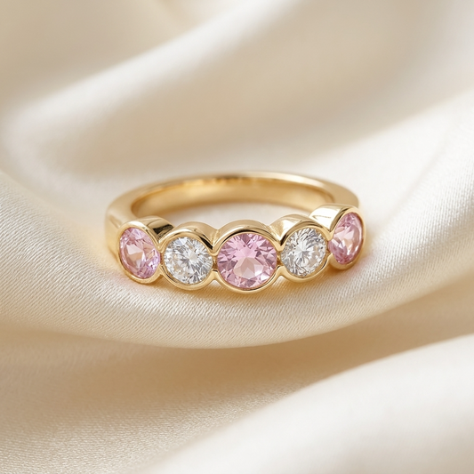 Pink sapphire and diamond eternity ring - side view