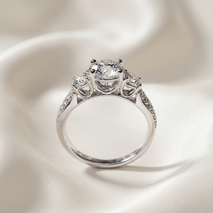 Melanie round brilliant diamond three stone engagement ring in 18ct white gold