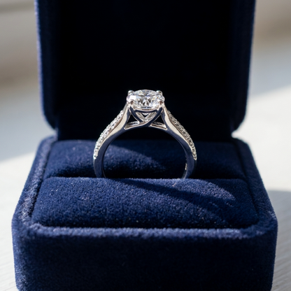 Round diamond ring with side stones - side view