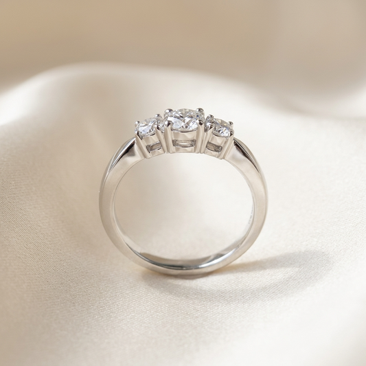 Emily round brilliant diamond three stone engagement ring in 18ct white gold