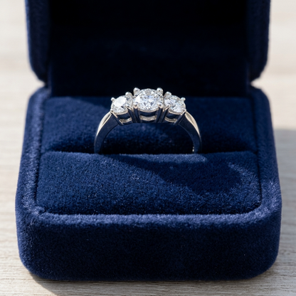 Sascha round brilliant diamond three stone engagement ring, angled view