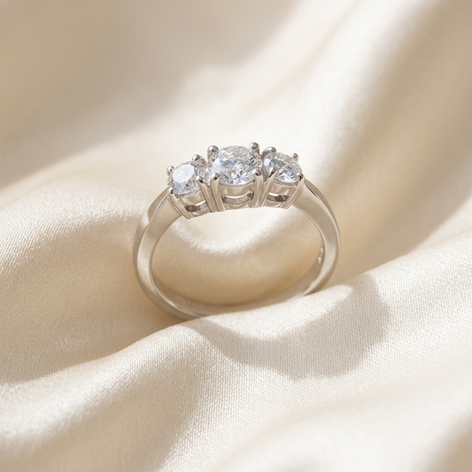 Sascha round brilliant diamond three stone engagement ring in 18ct white gold