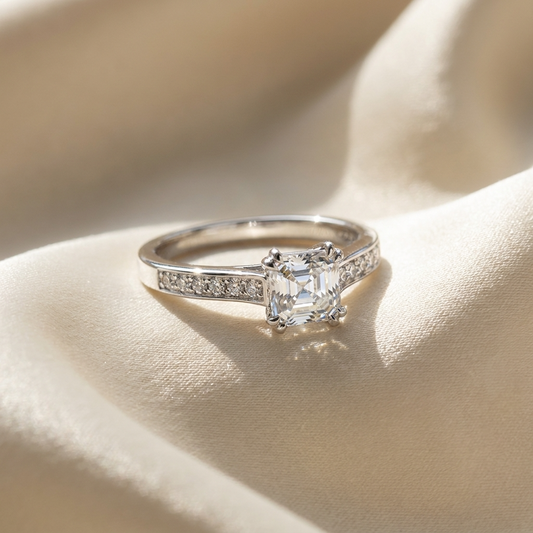 Asscher cut diamond ring with side stones - angled view
