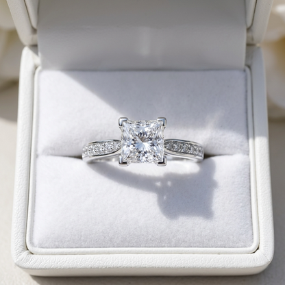 Naomi princess cut diamond engagement ring with diamond side stones, side view