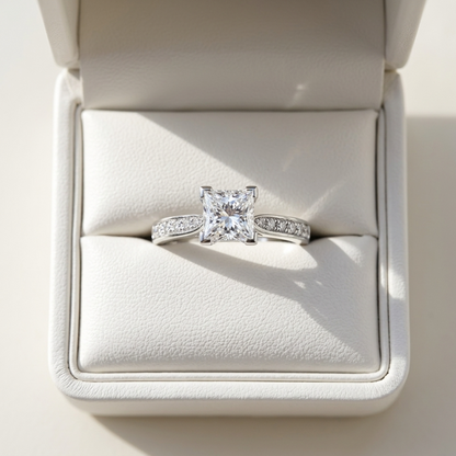 Naomi princess cut diamond engagement ring with diamond side stones, top view