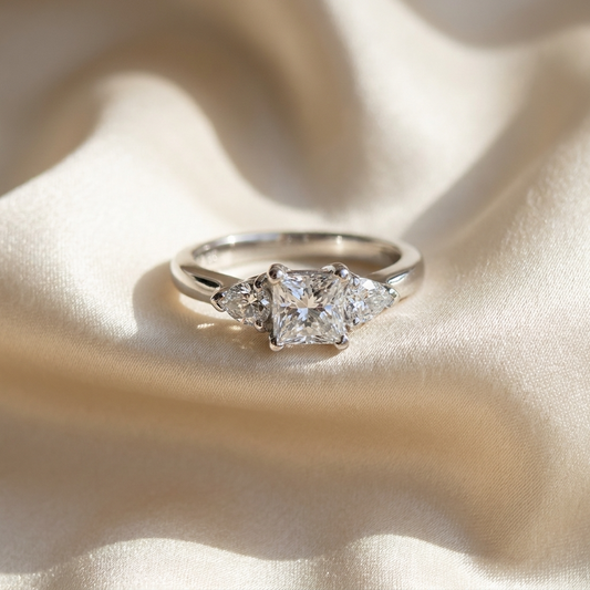 Camille princess cut diamond three stone trilogy ring, angled view