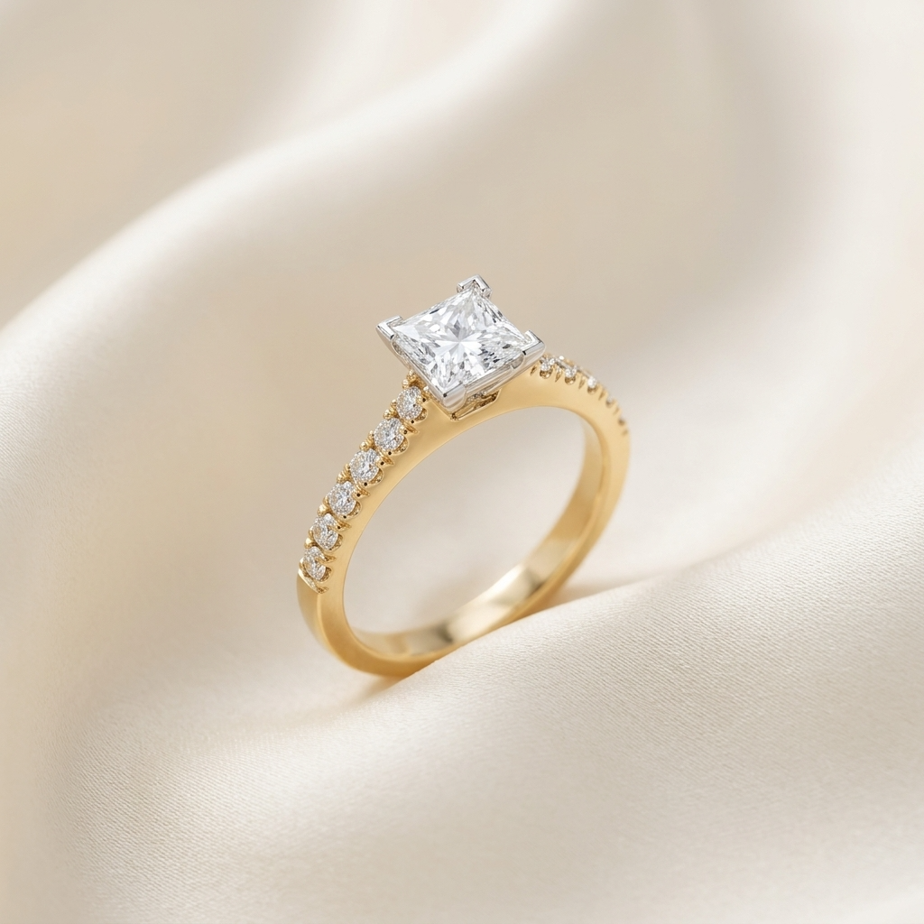 Victoria princess cut diamond engagement ring with diamond set band, angled view
