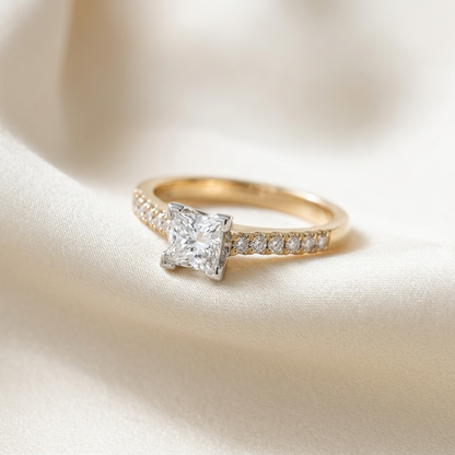 Victoria princess cut diamond engagement ring with diamond set band, side view