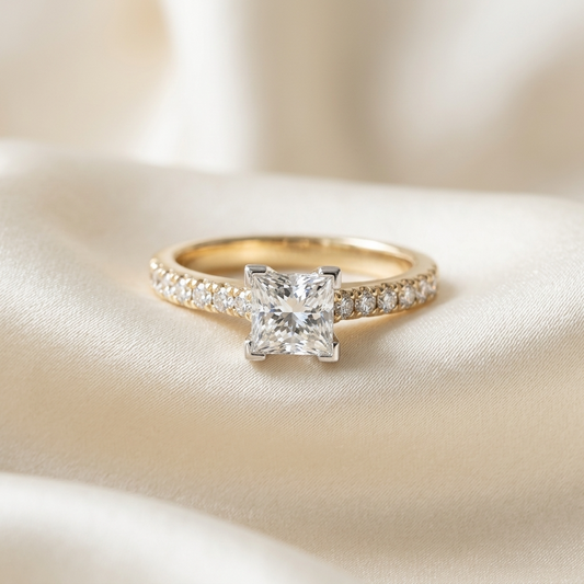 Victoria princess cut diamond engagement ring with diamond set band in two tone 18ct yellow and white gold