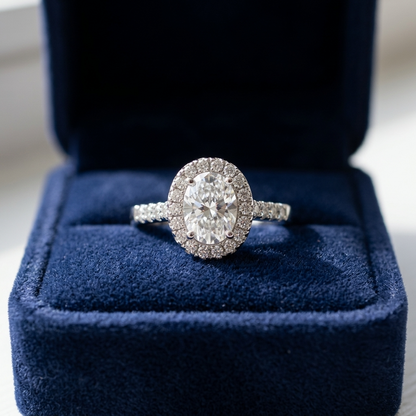 Lucienne oval cut diamond halo engagement ring in white gold