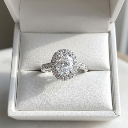 Lucienne oval cut diamond halo engagement ring, front view