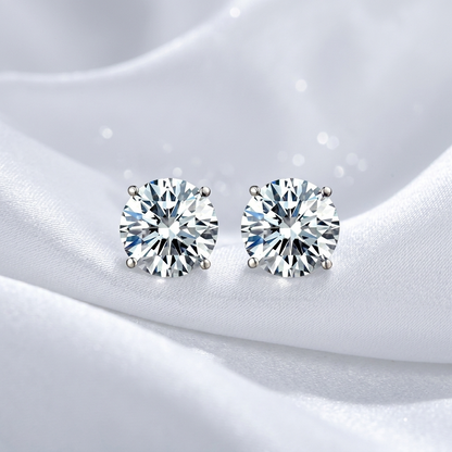 Round diamond stud earrings four claw setting - angled view