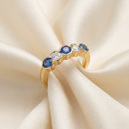 Sapphire and diamond eternity band - angled view
