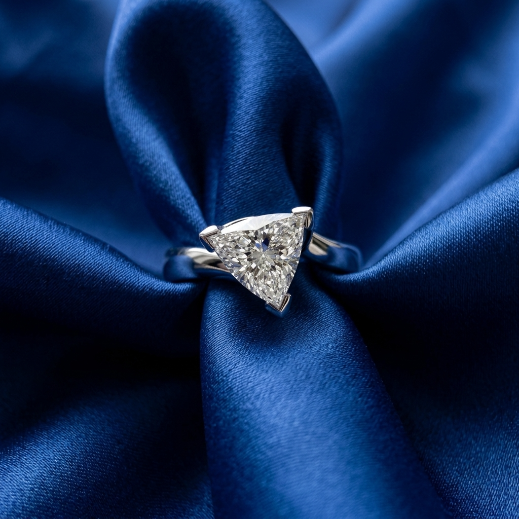Trilliant cut diamond angled solitaire engagement ring — handcrafted in Sydney