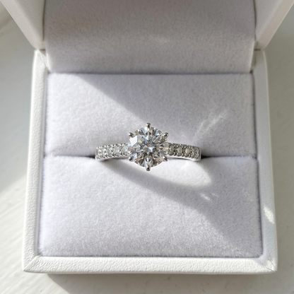 Round diamond ring with side stones - detail view